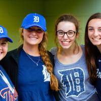 Group of four young women at Comerica Park event